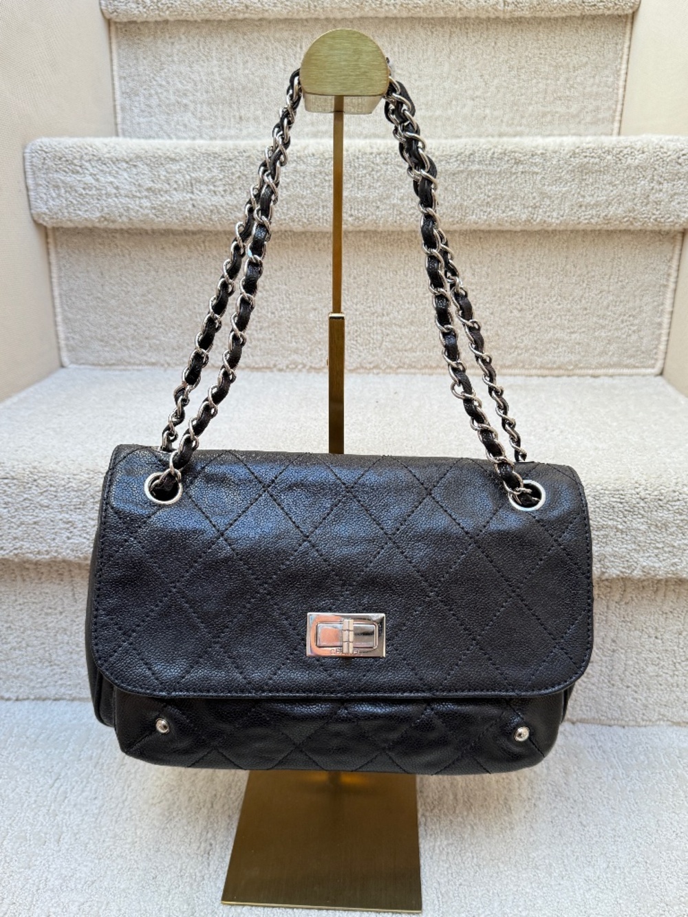 Chanel 2.55 re-issue handbag in Black Caviar leather with ruthenium Hardware
